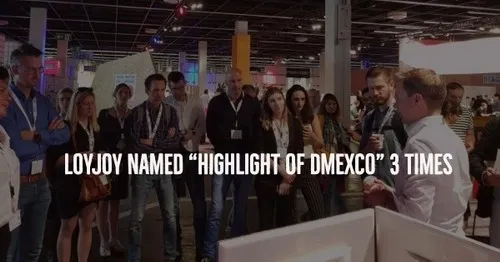 A crowd of people at a fair listening to our CEO Ulf Loetschert.