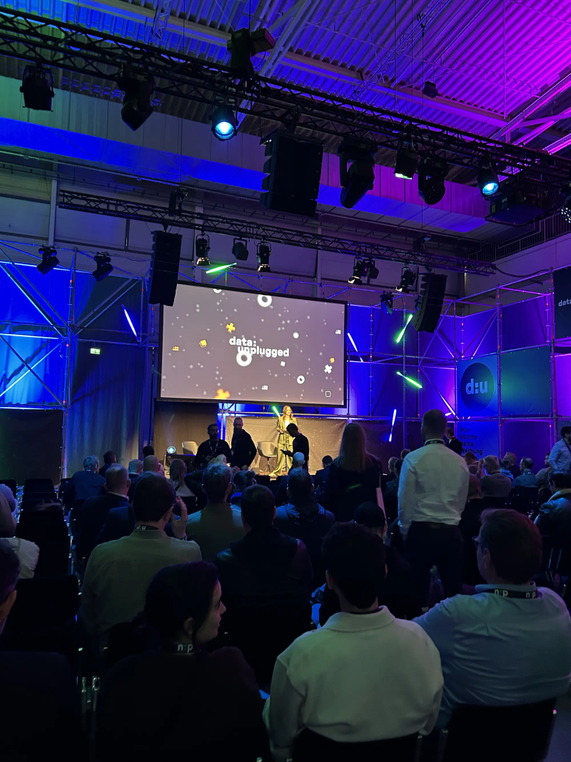 The photo shows the stage at data:unplugged 2026.